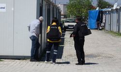 Kendini konteynere kilitleyen genç polisi alarma geçirdi