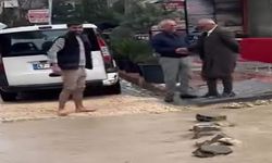 Sağanakta vatandaşlardan alkış alan yardım