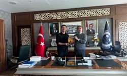 Göç Kültürünün Hafızası“Koçername” Rektör Alkış’a Takdim Edildi