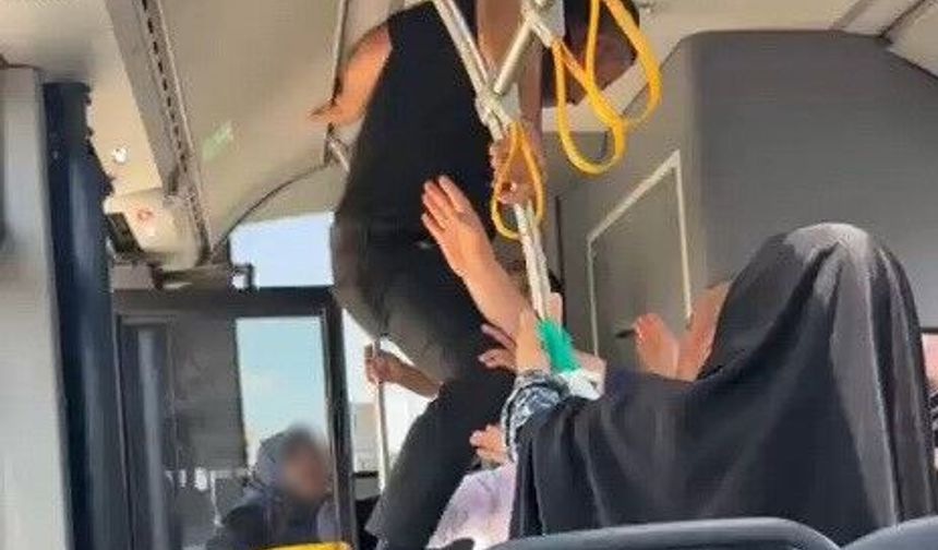 Otobüste tekmeli, yumruklu kavga