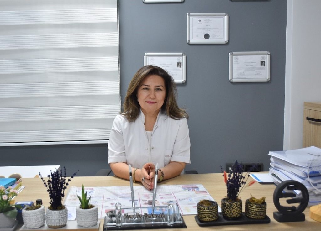 Dr. Emine Al