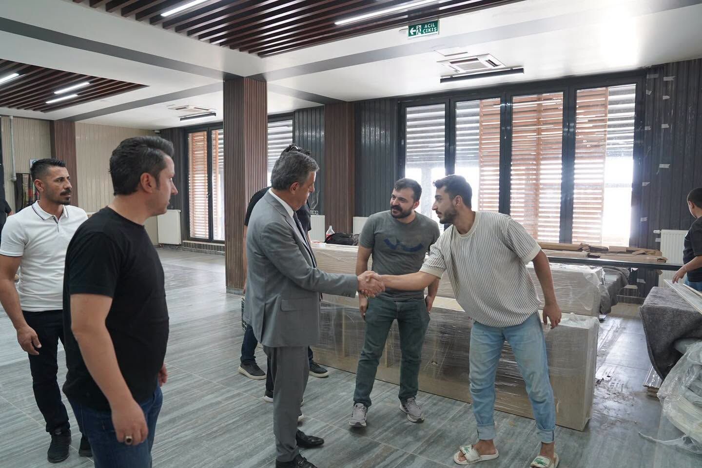 Nuhun Ambrı0